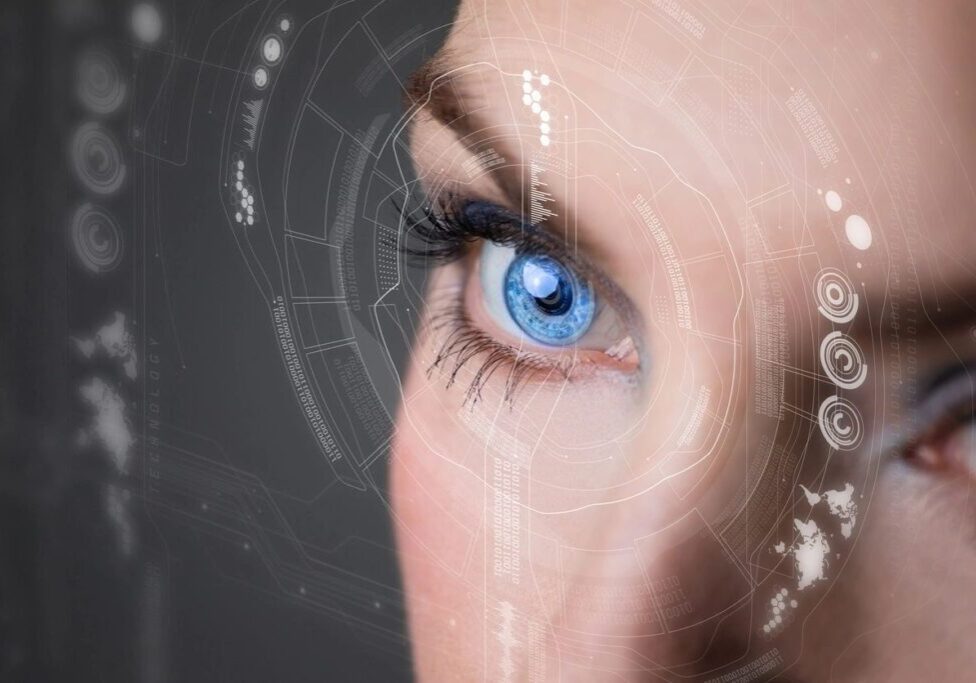 A woman 's eye with blue eyes and spider web around it.